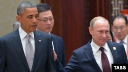 АҚШ президенті Барак Обама мен Ресей президенті Владимир Путин Азия-Тынық мұхит аймағы экономикалық саммитінде. Пекин, 11 қараша 2014 жыл.