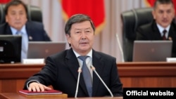 An official photo of Prime Minister Jantoro Satybaldiev being sworn into office in Bishkek on September 12. 