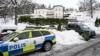 Police secure the area at a house where Swedish security services arrested Sergei Skvortsov on suspicions of espionage, in the Stockholm area, on November 22, 2022.