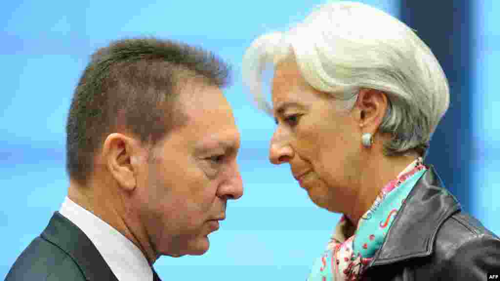 OCTOBER 8, 2012 -- Greek Finance Minister Ioannis Stournaras (left) faces International Monetary Fund chief Christine Lagarde before a Eurogroup Council meeting in Luxembourg. (AFP/John Thys) 