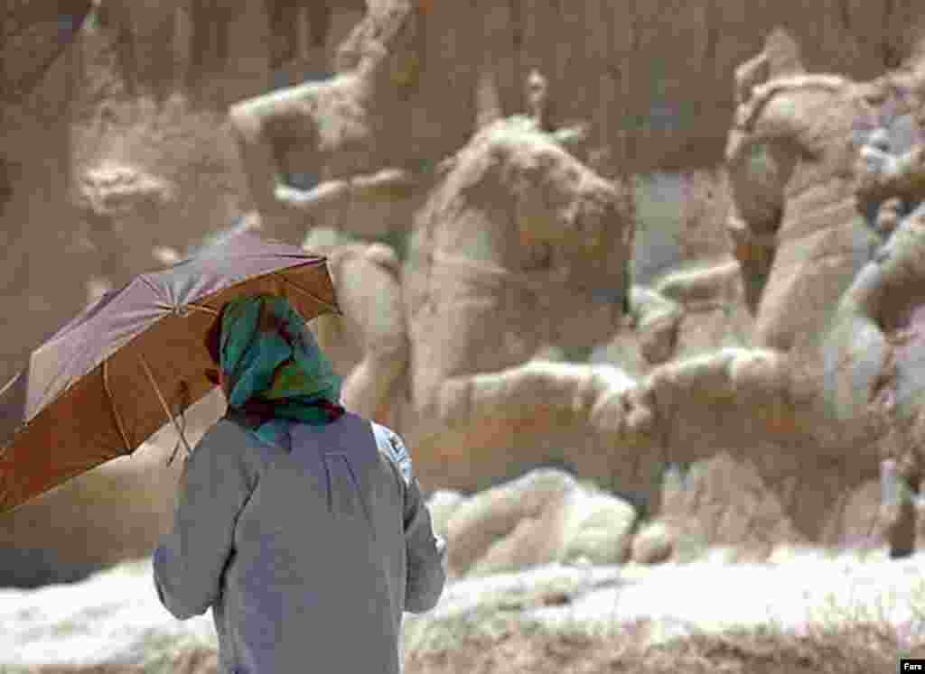 A tourist at Persepolis this summer (Fars) - Why is ancient Persian history now being accepted, even celebrated? Many Iranians are finding in their pre-Islamic past a new source of pride. 