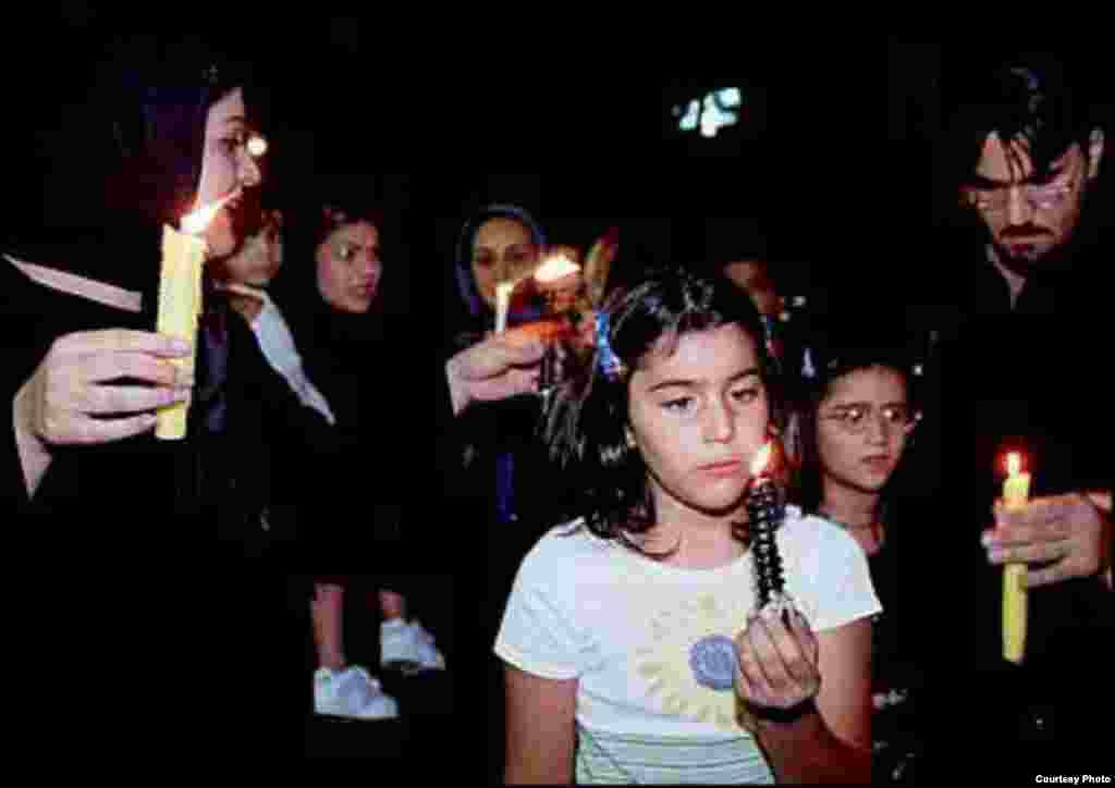 Iranians hold a candlelight vigil in Tehran for the victims of the 9/11 attacks.