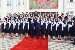 Tajik President Emomali Rahmon opens a new school building in the Spitamen district on March 25.