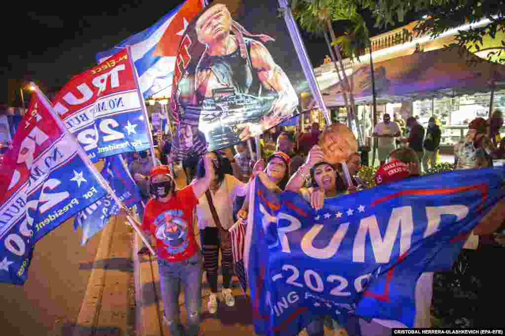Сторонники Трампа заранее празднуют его победу в Майами, штат Флорида.