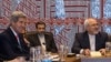 U.S. Secretary of State John Kerry (left) and Iran's Foreign Minister Mohammad Javad Zarif (far right) during a meeting at UN headquarters in September. 