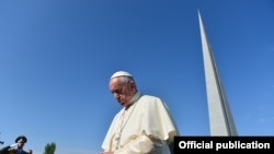 Pope Francis visits the Armenian genocide memorial in Yerevan on June 25.