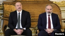 Russia - Azeri President Ilham Aliyev and Armenian Prime Minister Nikol Pashinyan are seen during a visit to the Catherine Palace in Saint Petersburg, December 26, 2023.