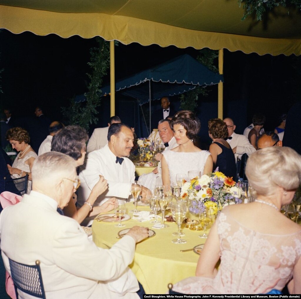 Jacqueline Kennedy with Pakistani President Mohammad Ayub Khan at a dinner in the United States one year before the first lady's historic visit to his country. The carefully cultivated relationship between Washington and Islamabad was partly about the battle for influence between the United States and the U.S.S.R.