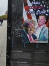 Posterë me mbishkrimin "Make Kosovo Great Again" dhe portretet e presidentit të zgjedhur të SHBA-së, Donald Trump, dhe të Richard Grenellit, të vendosura nëpër Prishtinë, Kosovë, 12 nëntor 2024.