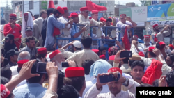 Members of Pakistan's Awami National Party (ANP) protested against the results of the July 25 parliamentary election in Charsadda, Khyber-Pakhtunkhwa Province, on July 30.