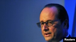 U.K. -- French President Francois Hollande speaks during a news conference on the second and final day of the NATO summit at the Celtic Manor resort, near Newport, in Wales September 5, 2014. 