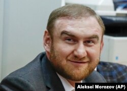 Rauf Arashukov smiles during hearings in a court in Moscow on January 30.