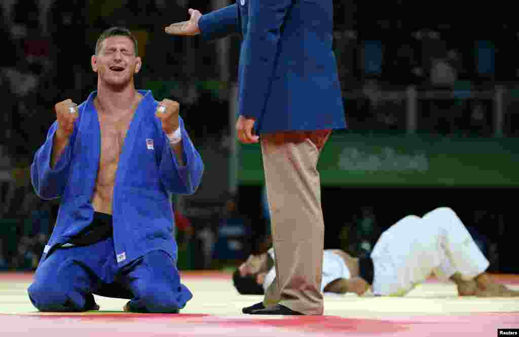 Lukas Krpalek beat Azerbaijan&rsquo;s Elmar Gasimov to win gold in the under-100 kilogram division for the Czech Republic&#39;s first-ever Olympic judo medal.