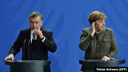 Uzbek President Seeks Improved Ties With Germany During Visit