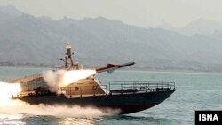 An Iranian ship test-fires Nasr 1 cruise missiles in March.