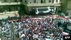 Syria -- A video grab shows hundres of anti-regime protesters demonstrating in the southern city of Daraa, 19Aug2011