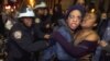 Members of the Occupy Wall Street movement clash with police officers after being removed from Zuccotti Park in New York in November. 