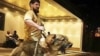 “This again is Tarzan...Our old friend,” Daudov wrote above a picture of Kadyrov restraining a lunging Caucasian Shepherd dog. “Tarzan just hates dogs of foreign stripes...Especially American ones.”