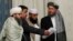 Members of the Taliban delegation take their seats during multilateral peace talks on Afghanistan in Moscow in November 2018.