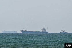 Vessels anchored off the coast of Sharjah in the United Arab Emirates, near the Strait of Hormuz on May 21.