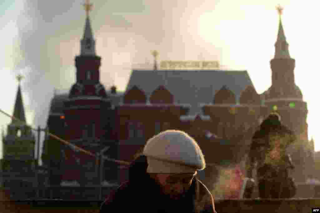 People brave the freezing outdoors in central Moscow.