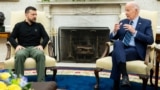 U.S. President Joe Biden (right) meets with Ukraine's President Volodymyr Zelenskiy in the Oval Office on September 26.