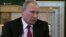 Путин отрицает связь хакеров с российской властью (видео)