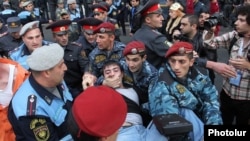 Armenia - Riot police detain a protester in Yerevan, 5Nov2013.