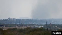 Smoke rises above the town of Avdiyivka, which has seen heavy fighting in recent days.