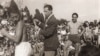Photograph of Fredy Hirsch (right), organizer of fitness training, sports competitions, and summer activities for Prague’s Jewish young people at Hagibor, 1930/40's. Edith Sheldon and Ada Löwy appear to be in the background behind Hirsch (left). Memory of Nations/Dita Krausová.