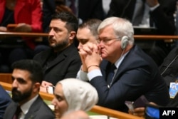 Президент України Володимир Зеленський і міністр закордонних справ Андрій Сибіга слухають виступ президента США Дональда Трампа на 81-й сесії Генеральної асамблеї ООН у штаб-квартирі ООН у Нью-Йорку 22 вересня 2026 року