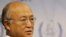 IAEA Director-General Yukiya Amano said it was his duty to "alert the world" about suspected Iranian efforts to develop atomic bombs.