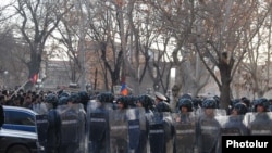 Armenia's former police chief said officers were ordered not to fire on opposition protesters.