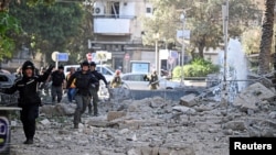 Urmările unui atac iranian cu rachetă la Haifa, în Israel. Loviturile din 22 iunie au venit după atacurile anunțate de SUA asupra siturilor nucleare iraniene