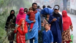 شماری از مهاجران اخراج شده از پاکستان(آرشیف)