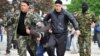 Пророссийские активисты ведут пленного в Донецке