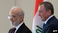 Архивное фото. Главы МИД Республики Беларусь Владимир Макей и Ирака Ибрагим аль-Джафари