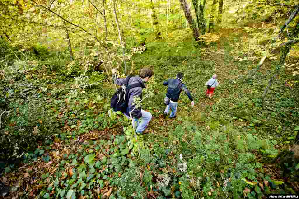 Rita Kravchenko walks through the woods near the village of Uch-Dere.