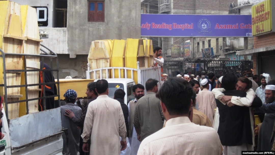Coffins can be seen outside the Lady Reading Hospital, where many of the 15 victims of the March 11 funeral bombing were taken.