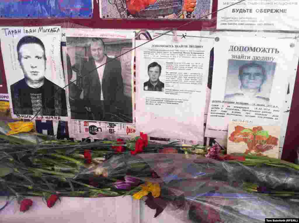 Pictures of missing people on Independence Square.&nbsp;