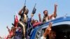 U.S. Urges New Iraqi Gov't, Sends Carrier