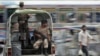 Troops keep guard at an intersection in Karachi 