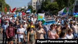 People take part in an anti-Kremlin rally in support of former regional governor Sergei Furga in the far eastern city of Khabarovsk on September 5.