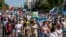 People take part in an anti-Kremlin rally in support of former regional governor Sergei Furga in the far eastern city of Khabarovsk on September 5.