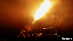 Українські військові ведуть вогонь на Харківщині, ілюстративне фото