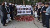 AFGHANISTAN -- Afghan residents pray and light candles to pay tribute to Afghan journalists killed in Monday's suicide attack in Kabul, May 3, 2018