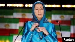 Maryam Rajavi, president-elect of the National Council of Resistance of Iran, delivers a speech during a gathering in Villepinte, near Paris, on June 30.