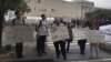 Türkmenistanda mejbury zähmete garşy geçirilen proteste gatnaşyjylar. Nýu-Ýork, 1-nji oktýabr. 