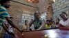 Sri Lanka Church Blasts -- Lalitha, center, weeps over the coffin with the remains of 12-year old niece, Sneha Savindi, who was a victim of Easter Sunday bombing at St. Sebastian Church, after it returned home in Negombo, Sri Lanka, Monday, April 22, 2019