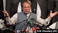 Former Pakistani Prime Minister Nawaz Sharif addresses his party supporters in Lahore on October 4.